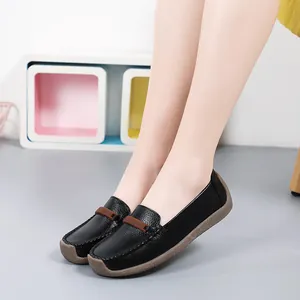 Comfortable black leather loafers for women with soft gum sole and stylish strap detail.