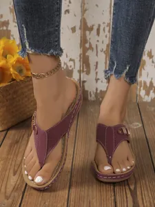 Stylish burgundy wedge platform thong sandals with hollow detail and metal buckle