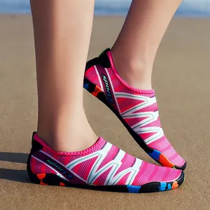 Breathable quick-dry aqua shoes for hiking and beach activities in vibrant pink