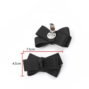 Detailed measurements of black knitted bow shoe clips, 7.5cm width and 4.5cm height