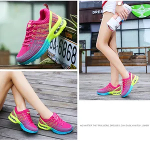 Detail views of colorful gradient women's running shoes featuring air cushion soles