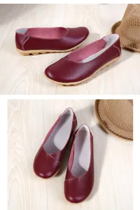 Detailed view of women's maroon leather loafers with soft gum rubber soles