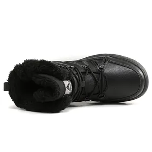 Black women's winter snow boots with thick faux fur lining and lace-up design.