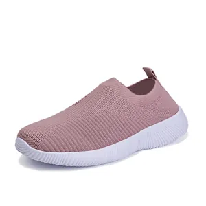 Comfortable women's casual mauve fly-knit sock shoes with lightweight white soft sole for walking