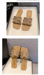 Close-up detail showing sparkling rhinestone buckles on elegant square-toe flat slippers