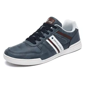 Eleganti sneaker casual da uomo in pelle blu con strisce bianche e dettagli a stella