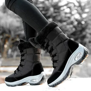 Botas de nieve de invierno negras y cálidas con forro de piel gruesa y suela de cámara de aire