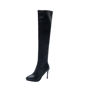 Sexy black over-the-knee boots with pointed toe and stiletto high heel in stretch leather
