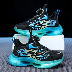 Children's sports shoes with breathable mesh and rotating buckle in black and teal