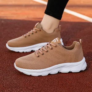Women's brown breathable mesh running sneakers with chunky white sole for outdoors