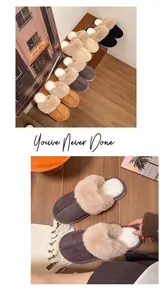 Detailed macro shot of grey plush slippers with thick faux fur lining on wooden floor