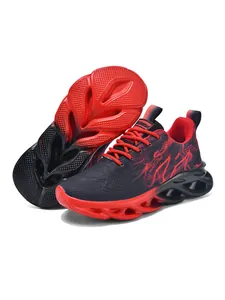 Detailed view of red and black kids athletic sneakers with shock-absorbing hollow outsole