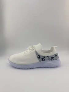 Side view of white breathable mesh knit walking shoes with leopard print detail