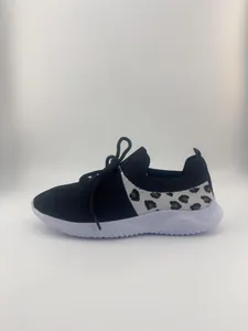 Detail view of breathable leopard print mesh knit women's walking shoes with white sole