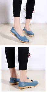 Side view of comfortable blue leather loafers for women with soft gum rubber soles