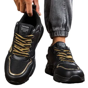 Men's trendy black sports running shoes with thick soles and stylish gold detailing