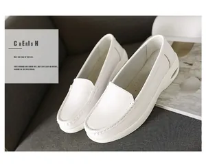 Side view of white leather nurse shoes with visible air cushion sole detail