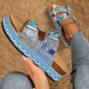 Detail shot of blue rhinestone platform sandals with braided rope and cork footbed.
