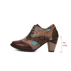 Ethnic style floral print pointed toe ankle boot with a stable 7cm block heel height