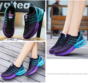Detailed view of the gradient mesh upper and air-cushioned sole of women's running shoes