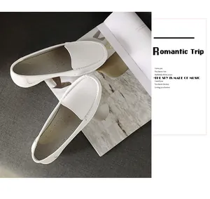 Detailed top view of comfortable white leather nurse shoes with soft breathable sole