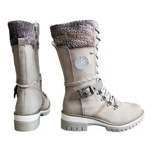 Detailed view of women's grey mid-calf martin boots featuring a warm knit collar and buckle