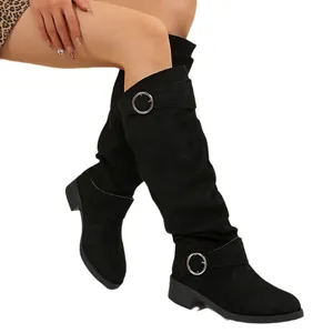 Elegant black slouchy knee-high boots with decorative silver buckles and a low block heel