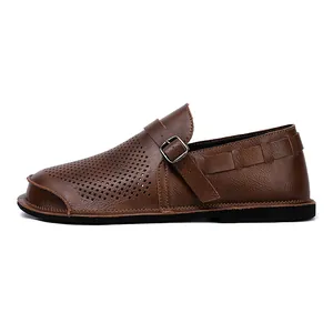 Side profile detail of retro brown leather wide-toe leisure shoes for men.