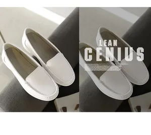 Close-up detail of white leather flat loafers with a soft air cushion sole for nurses.