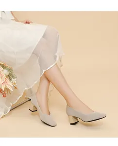 Elegant ribbed texture on beige chunky heel pumps with stylish square toe design