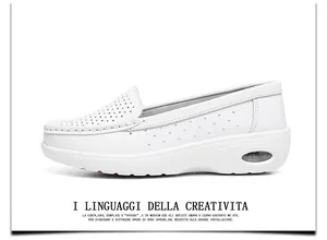 Detailed side view of white leather nurse shoes with air cushion and hollow design