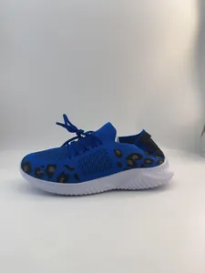 Side view of blue fly-woven walking shoe with leopard print details