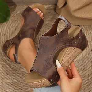 Macro detail of retro brown platform wedge sandals featuring cork patterned sole