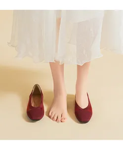 Detailed view of burgundy woven mesh ballet flats with square toe for summer comfort