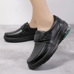 Comfortable black leather nurse work shoes featuring air cushion sole and velcro strap