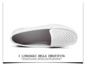 Top view of white perforated leather nurse shoes with soft cushioned sole