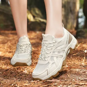 Lightweight cream outdoor hiking shoes for men and women with breathable mesh panels