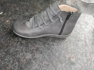 Women's stylish casual flat ankle boots in grey with side zipper and decorative lacing