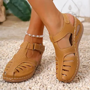 Close-up of women's retro Roman sandals featuring closed toe and white stitching