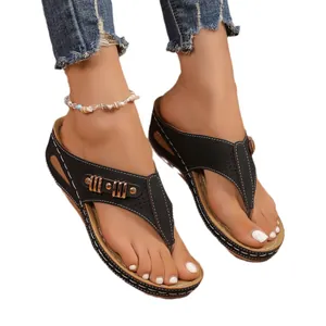 Elegant black wedge flip-flops for women with cutout design and white stitching details
