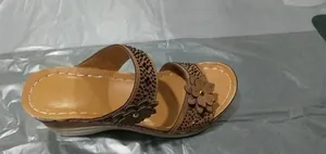 Comfortable floral wedge sandals with sparkling rhinestone accents in tan for women
