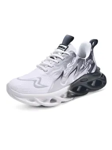 Side view of white and black gradient children's sneakers with chunky hollow sole