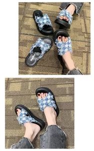 High-quality detail view of blue plaid frayed cross-strap platform sandals on feet