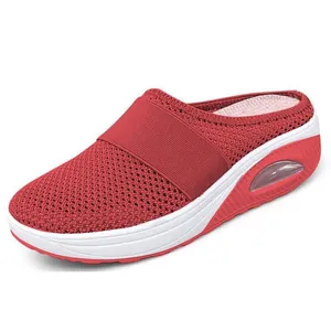 Detailed view of women's red mesh platform mule slipper featuring an air cushion heel.
