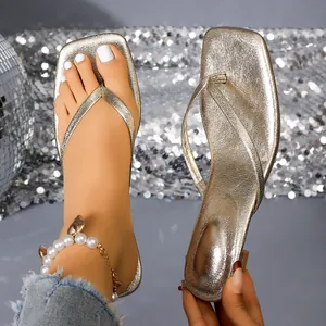 Elegant champagne gold metallic low heel thong sandals with stylish square toe