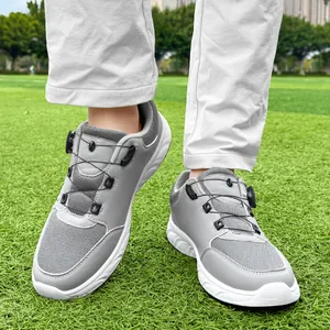Detailed close-up of men's lightweight grey golf shoes with rotating buckle dial