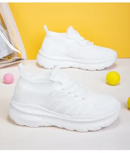 Side detail view of lightweight white flyknit sock sneakers with stylish thick soles