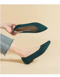 Breathable dark green pointed-toe knit flat shoes for women shown from side and top