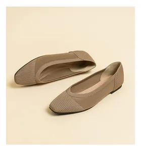 Detailed view of women's brown knitted mesh flat shoes featuring elegant square toe design