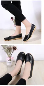 Detail of black pebbled leather loafers for women with soft nubby non-slip rubber sole